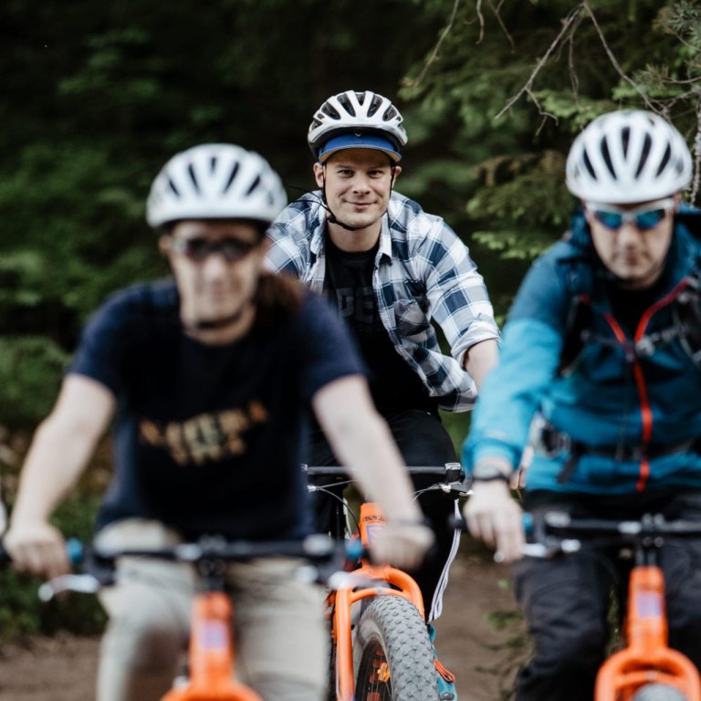 A group fatbiking in nature