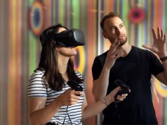 Two people using virtual reality glasses.